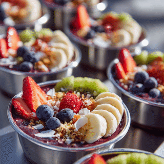 Fresh acai bowls with berries, banana and granola
